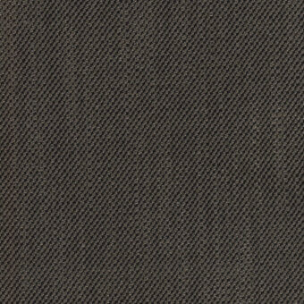 Charcoal gray fabric sample with a dense, dotted, diagonal weave texture; white label displays “turri > fabric cat. b > 759 c” text.